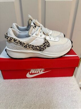 Nike Women's White Sneakers with Leopard Swoosh Accent